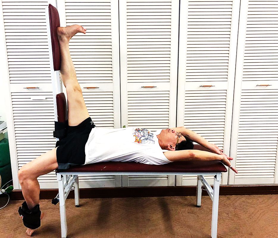 healthcaretoday, la-jing, stretching shrunken tendons, urinary problems, headaches, la-jing lying down, neck pain, waist and back pain, alternative treatment, complimentary medicine, 